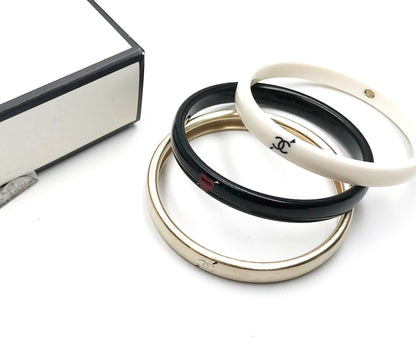 CHANEL Gold Ivory Black Love Arrow CC Bracelet Bangle